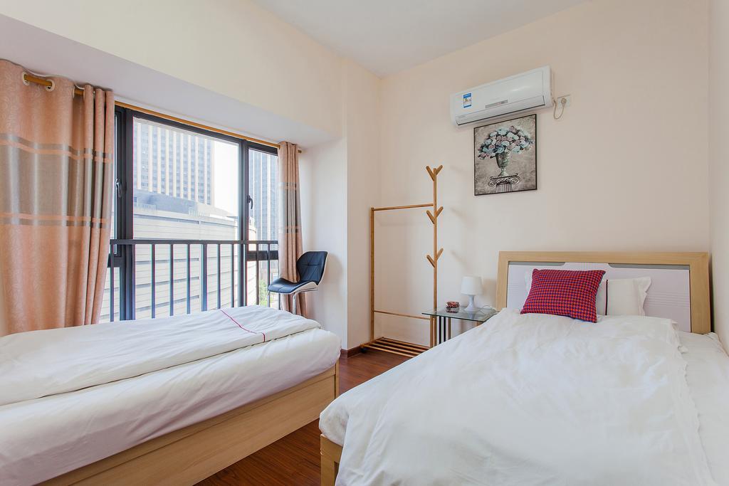 Feier Apartment Shajing Værelse billede